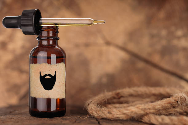 A bottle of premium beard oil with a dropper, highlighting the best oils for beard growth and moisture for a healthy and well-groomed beard.